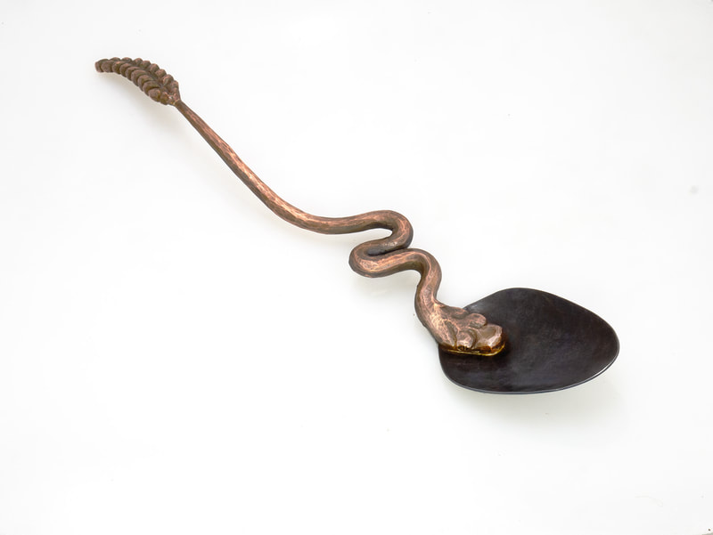 Forged and chased rattlesnake spoon